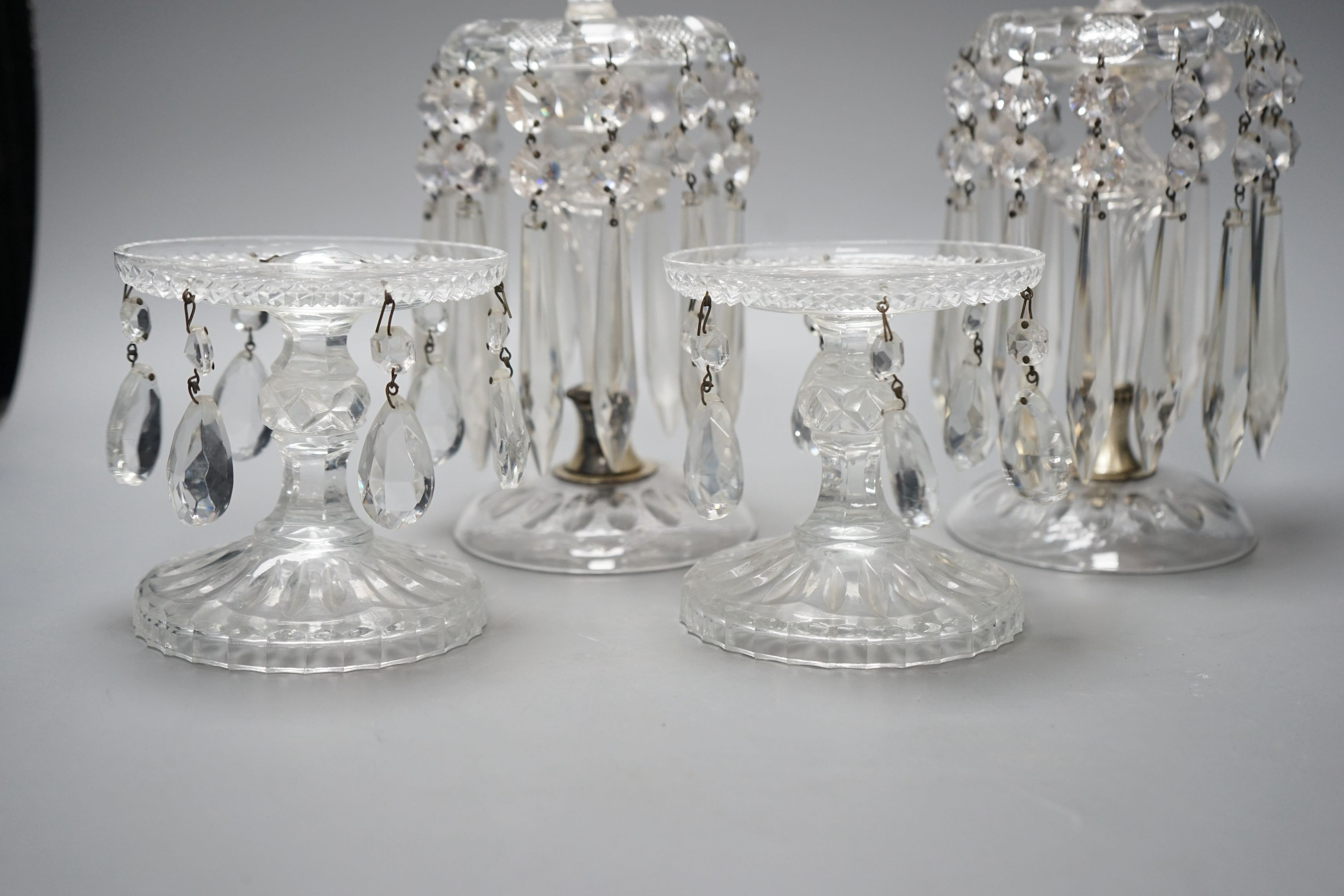 Two pairs of glass lustres, tallest 25cms high